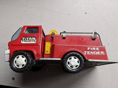 Old metal tin toy - tin, fire